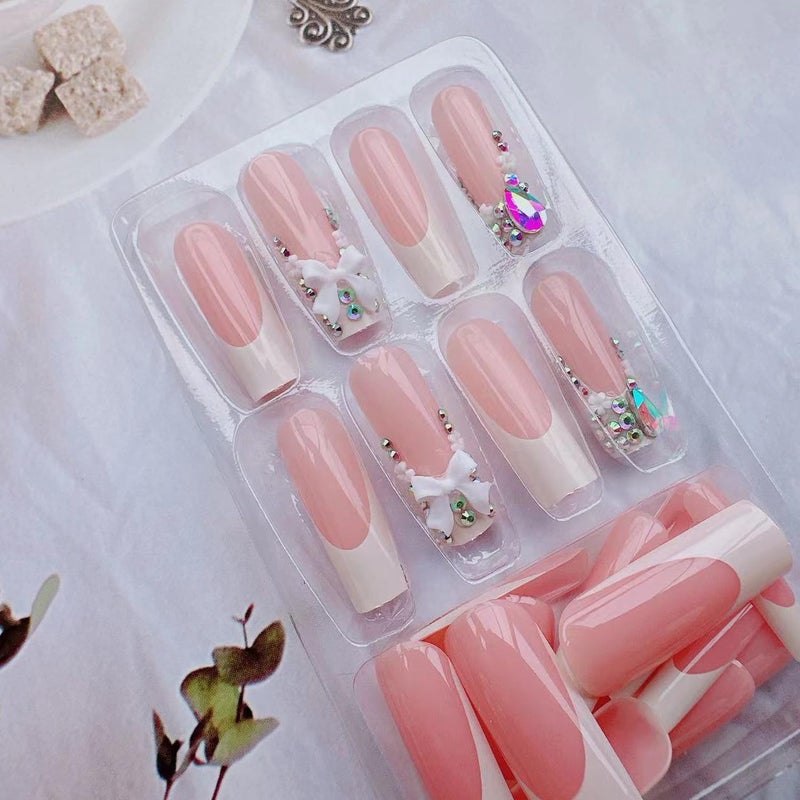 BSBTBZ 24pcs Long Press on Nails Coffin Nails Shiny with Charms French luxury Fake Nails Bow Flower Designs Cute Press ons Rhinestone Nails White French False Nail Tip Artificial Nails Finger Manicure - Image 3